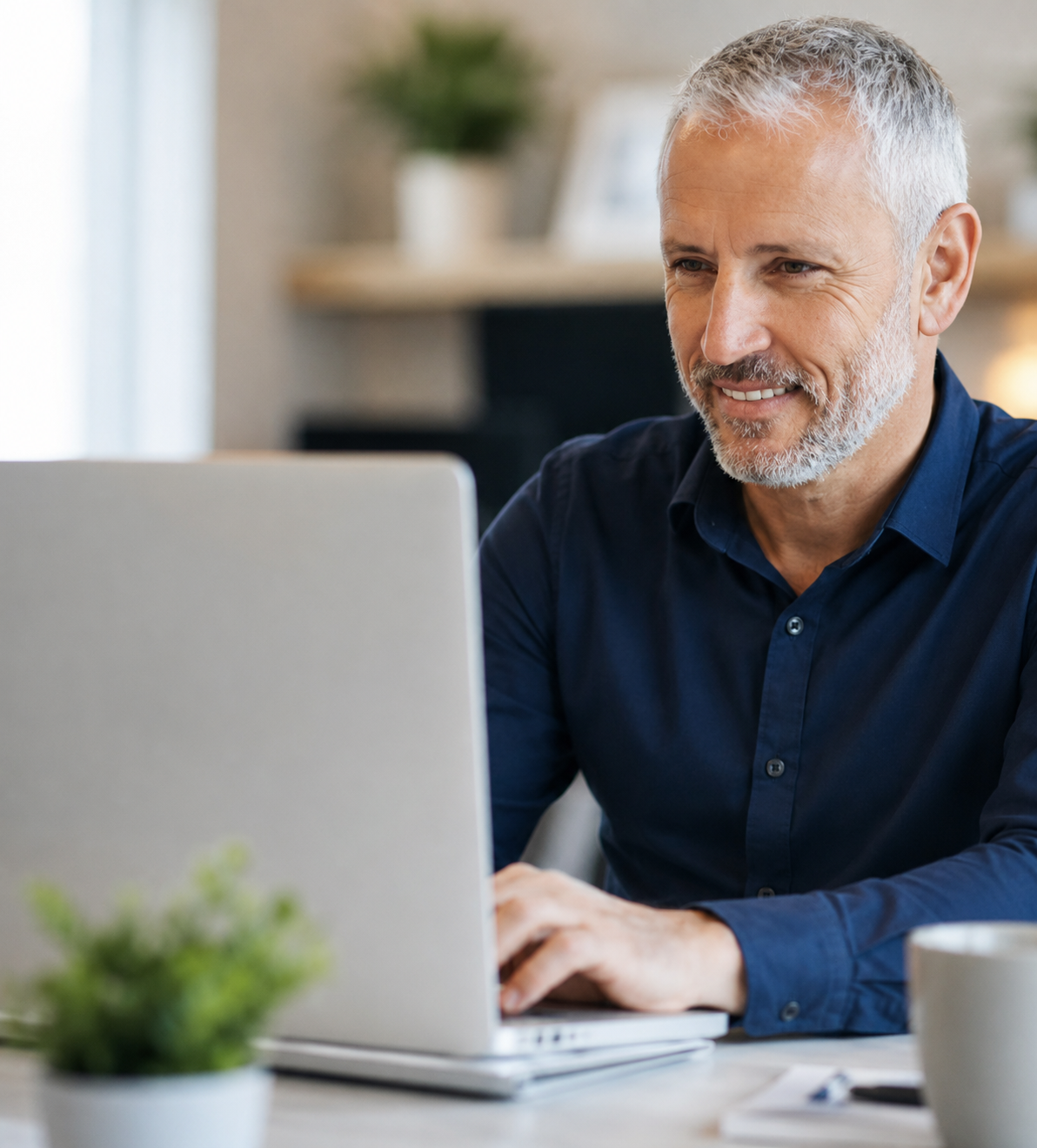 MSP business owner working at laptop - C4 Solutions