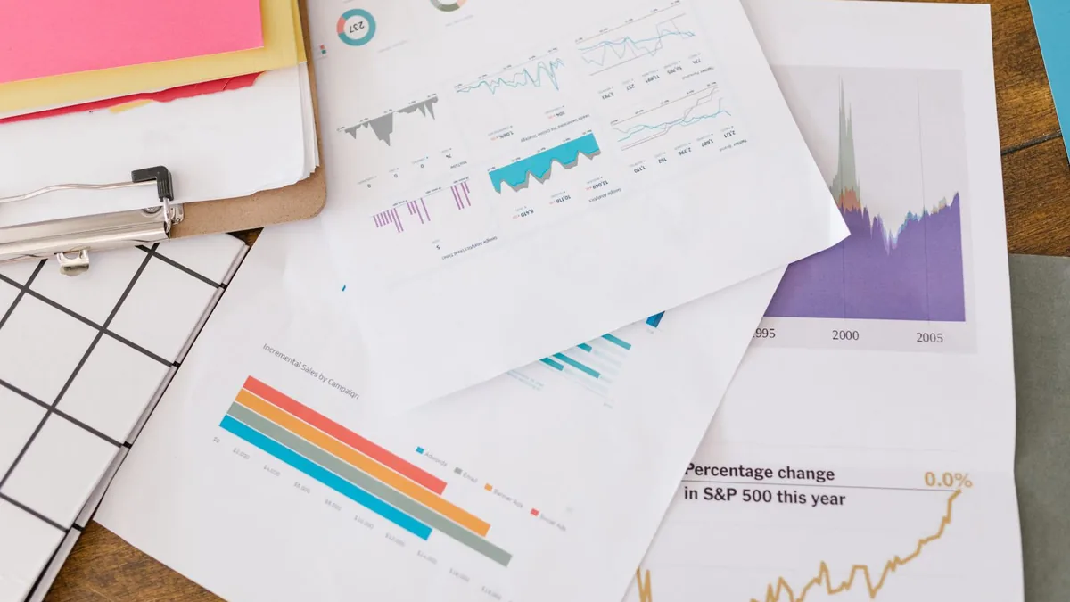 Printed marketing analytics reports used to compare marketing software for MSPs