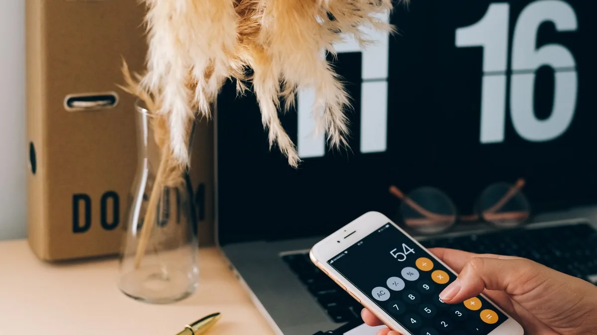 Calculator app on a phone used to work out MSP cost per lead