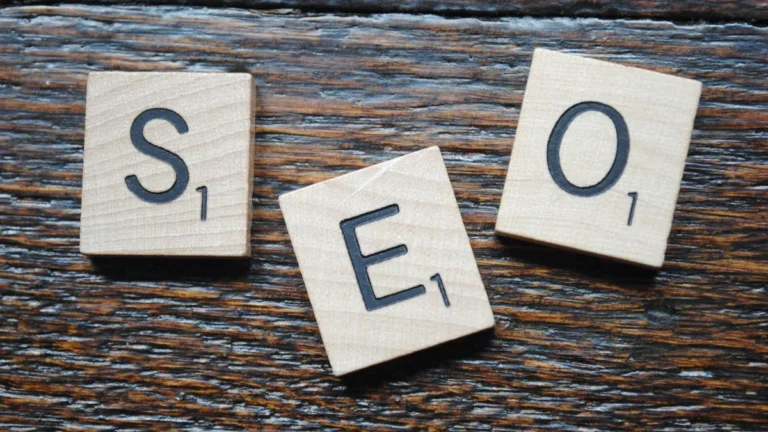 MSP SEO services concept: wooden letter tiles spelling SEO on a desk