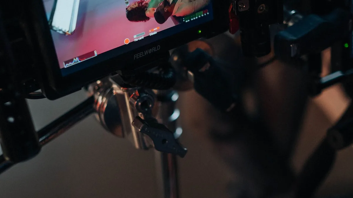 Camera monitor showing a live preview on set, part of MSP video production cost