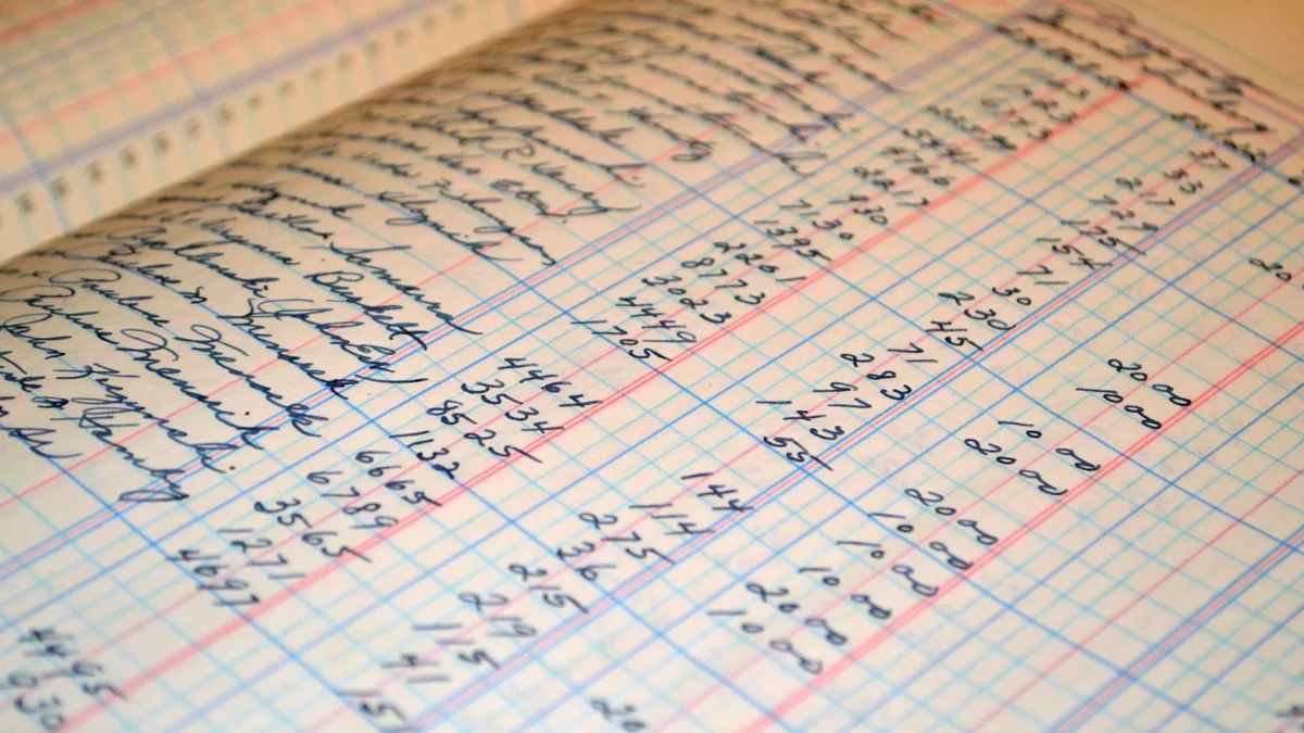 Handwritten ledger columns, the kind of record behind every EBITDA add-back an MSP claims